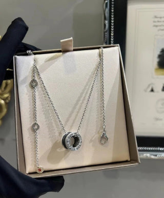 Bvlgari Silver Black Accent Circle Pendant Necklace – Elegant Luxury Jewelry