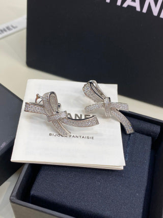 CHANEL Bellarienne Crystal Bow Stud Earrings