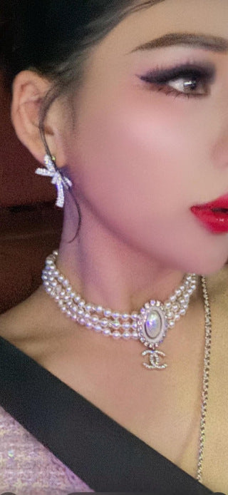 CHANEL Bellarienne Crystal Bow Stud Earrings