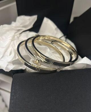 CHANEL Arabelle Triple Layer Signature Bracelet