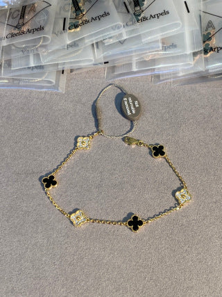 Van Cleef & Arpels Mini 6-Motif Bracelet with Black Onyx and Diamonds