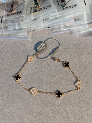 Van Cleef & Arpels Mini 6-Motif Bracelet with Black Onyx and Diamonds