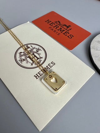 Hermès Kelly Lock Heart Charm Necklace