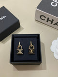 CHANEL Marcelline Lock Charm Stud Earrings