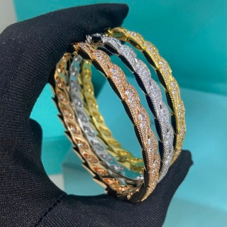 Tiffany wide feather bracelet fully set with diamonds
