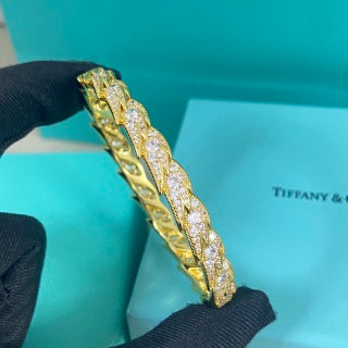 Tiffany wide feather bracelet fully set with diamonds