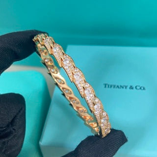 Tiffany wide feather bracelet fully set with diamonds