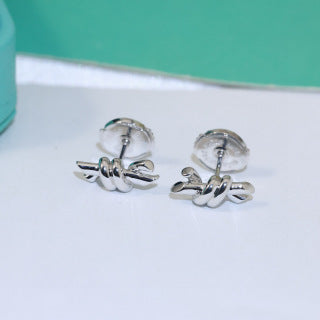 Tiffany Knot Stud Earrings – Polished Gold-Tone Metal