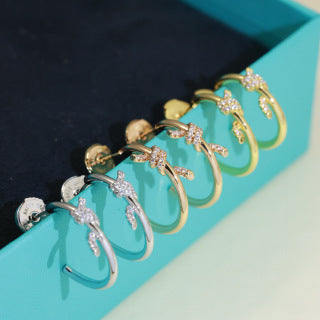 Tiffany Knot Stud Earrings – Polished Finish with Half-Pavé Diamonds