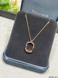 Tiffany Small Lock Necklace with a Single Pink Diamond