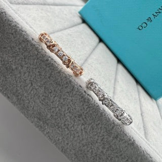 Tiffany narrow ring with three diamonds set between X-shaped motifs
