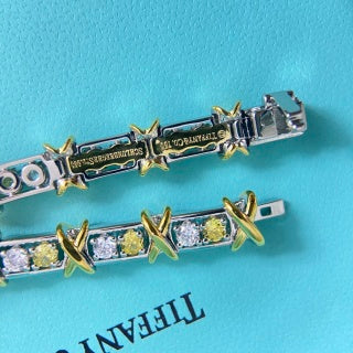 Tiffany & Co. rose gold multi-link flexible bracelet with diamond-set cross motifs