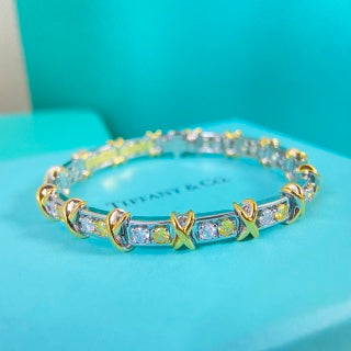 Tiffany & Co. rose gold multi-link flexible bracelet with diamond-set cross motifs