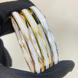 Bvlgari Tri-Color Gold Wide Cuff Bracelet – Elegant Luxury Jewelry
