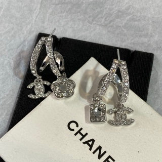 CHANEL Eveloria Silver Charm Cascade Drop Earrings