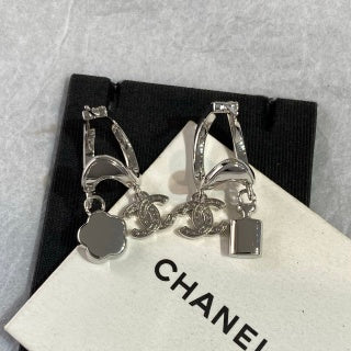 CHANEL Eveloria Silver Charm Cascade Drop Earrings
