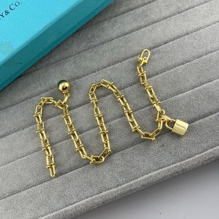 Tiffany Double-Layer Bracelet with Large Spheres, Lock Charm, and Double-U Horseshoe Links