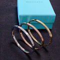 Tiffany & Co. Engraved Letter Narrow Bangle