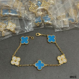 Van Cleef & Arpels Turquoise and Diamond Five-Motif Bracelet