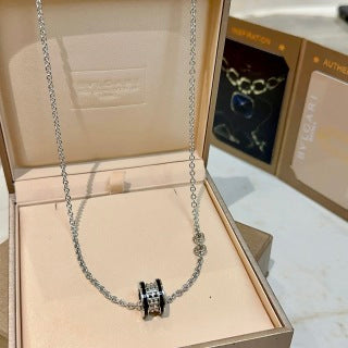 Bvlgari Silver Black Circle Pendant Necklace – Elegant Luxury Jewelry