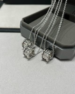 Bvlgari Silver Geometric Circle Pendant Necklace – Elegant Luxury Jewelry