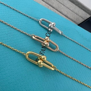 Tiffany Small Double U Horseshoe Polished Gold Pendant Necklace