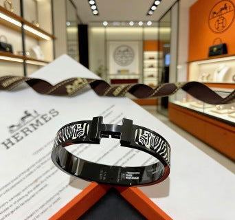 Hermès Clic H Noir Zebra Enamel Bracelet