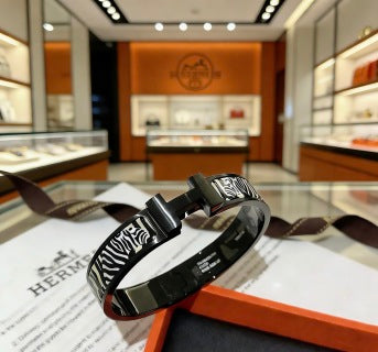 Hermès Clic H Noir Zebra Enamel Bracelet