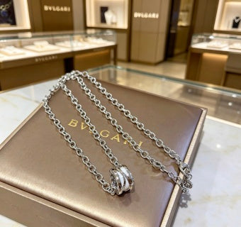 Bvlgari White Gold Circle Pendant Necklace – Elegant Luxury Jewelry