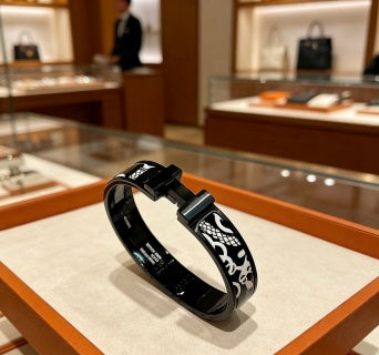 Hermès H Eclat Pattern Leather Cuff Bracelet