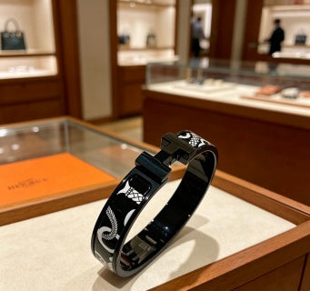Hermès H Eclat Pattern Leather Cuff Bracelet