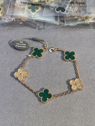 Van Cleef & Arpels Malachite 5-Motif Clover Bracelet with Gold-Tone Details