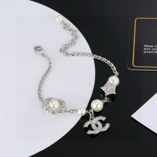CHANEL Althea Pearl Charm Chain Bracelet