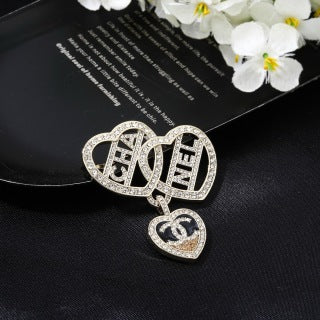 CHANEL Lucienne Heart Emblem Statement Brooch