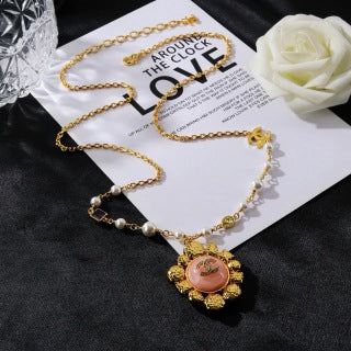 CHANEL Elaraine Pearl Charm Long Necklace