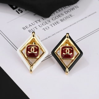 CHANEL Delphine Ruby Diamond Emblem Brooch