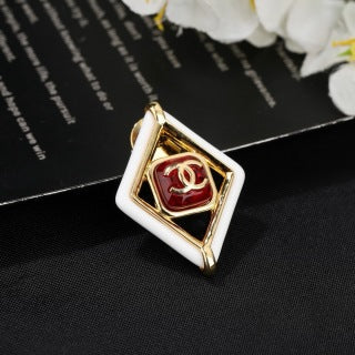CHANEL Delphine Ruby Diamond Emblem Brooch