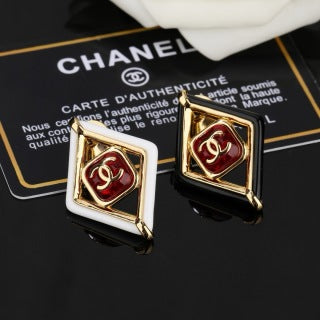 CHANEL Delphine Ruby Diamond Emblem Brooch