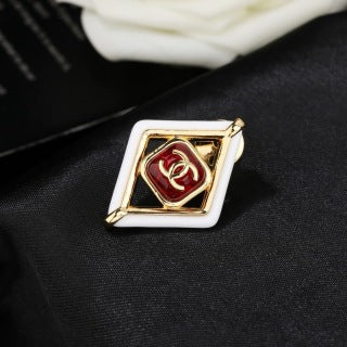 CHANEL Delphine Ruby Diamond Emblem Brooch