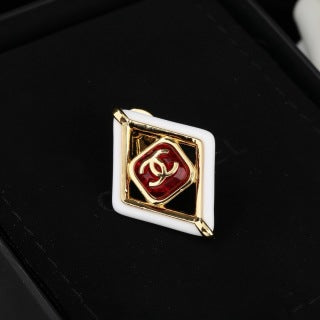 CHANEL Delphine Ruby Diamond Emblem Brooch
