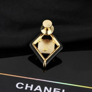 CHANEL Delphine Ruby Diamond Emblem Brooch