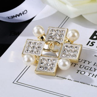 CHANEL Aureline Pearl Cross Emblem Brooch