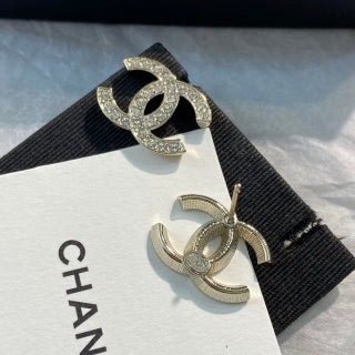 CHANEL Evelisse Silver Signature Stud Earrings