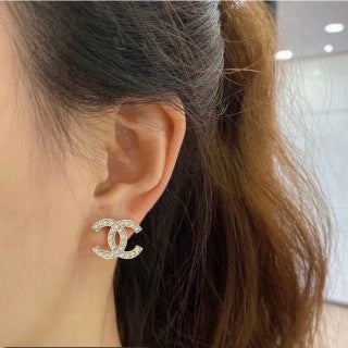 CHANEL Evelisse Silver Signature Stud Earrings