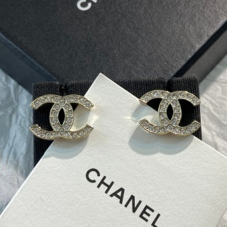 CHANEL Evelisse Silver Signature Stud Earrings