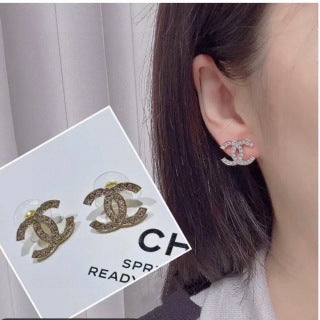 CHANEL Evelisse Silver Signature Stud Earrings
