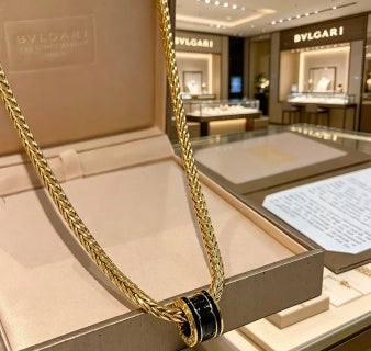 Bvlgari Gold Black Spiral Pendant Chain Necklace – Elegant Luxury Jewelry