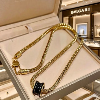 Bvlgari Gold Black Spiral Pendant Chain Necklace – Elegant Luxury Jewelry