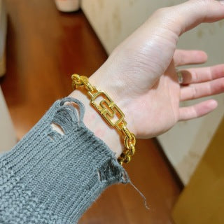 Bvlgari Gold Geometric Link Chain Bracelet – Elegant Luxury Jewelry