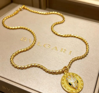 Bvlgari Gold Medallion Pendant Chain Necklace – Elegant Luxury Jewelry